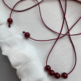 Satin string necklace 6 beads